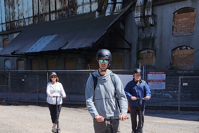 Experience Old Montreal on e-scooters with a local comedian - Stop 2: Canal-de-Lachine National Historic Site ride-by context