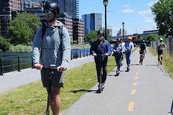 Experience Old Montreal on e-scooters with a local comedian - Meeting Goofy Welldone at 809 Rue William and getting oriented