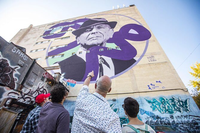 The Montreal Street Art & Mural Tour - Rue Duluth: cafés, mom-and-pop shops, and lots of mural texture